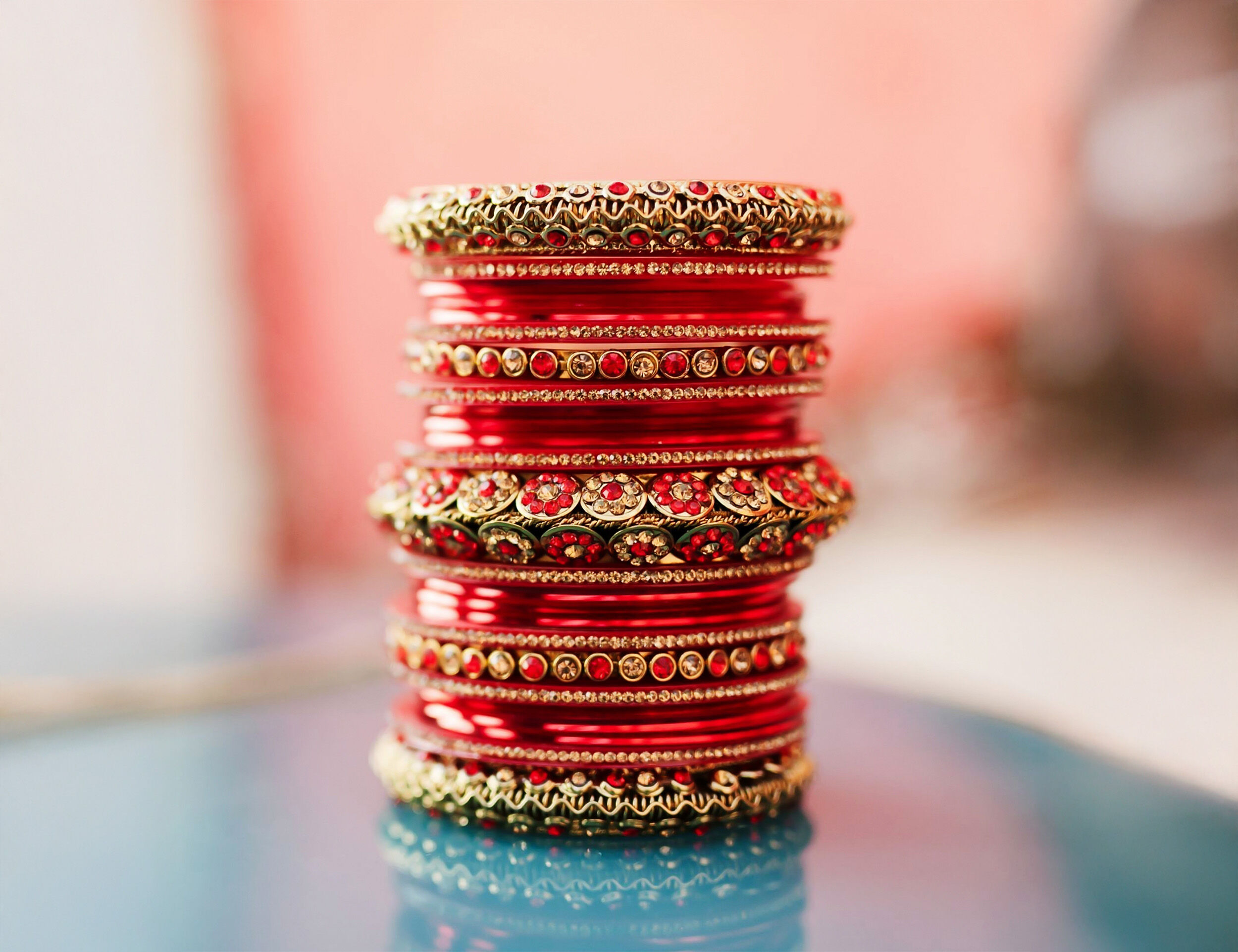 Red bangles for bride to match with bridal lehenga